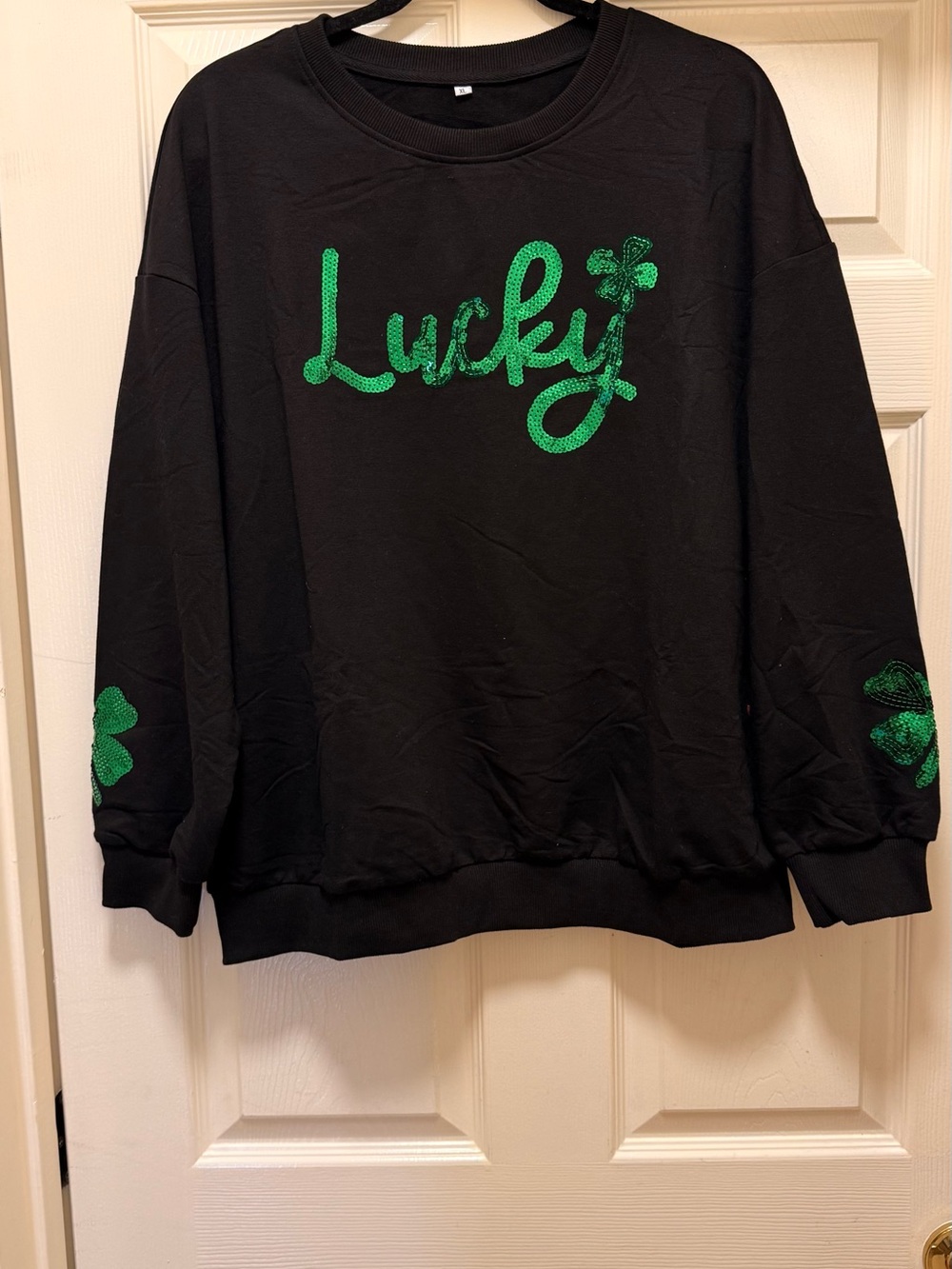 black crewneck sweatshirt features green sequin -size XL